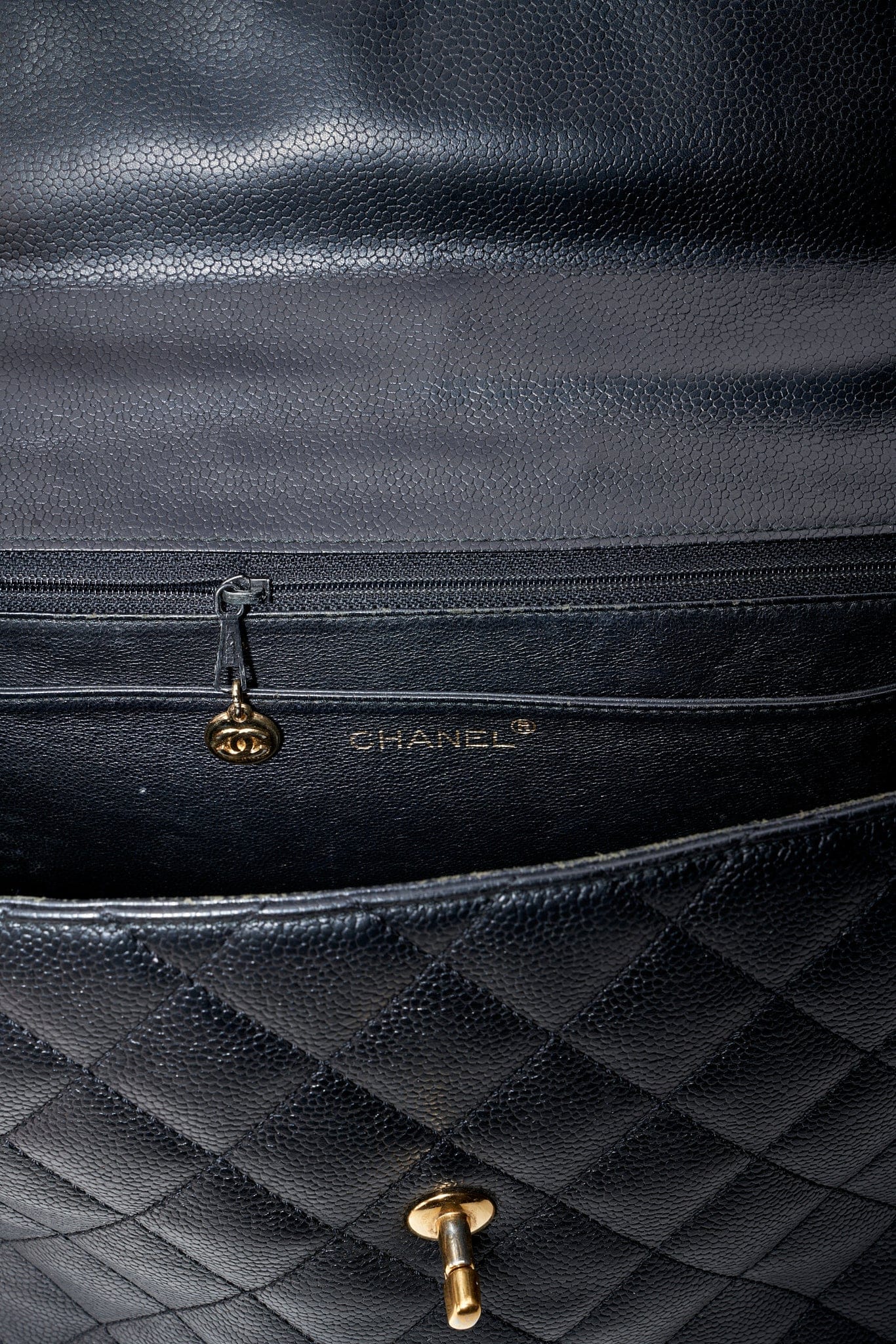 Vintage Chanel Kelly Top Handle Bag in Black Caviar Leather