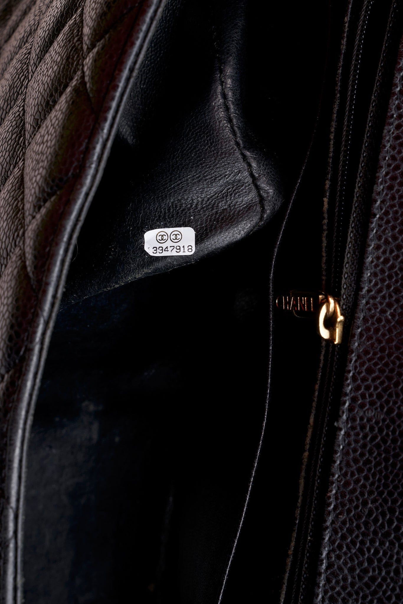 Chanel Classic Flap Bag in Black Caviar Leather with Gold Tone Hardware