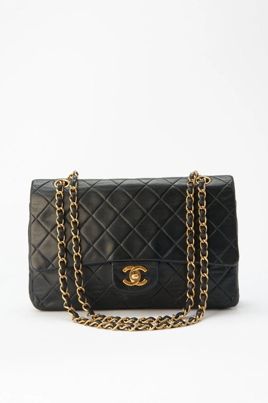 When did Chanel stop using real gold on their bags?