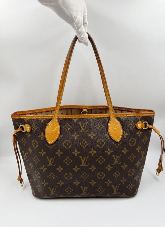 Which Louis Vuitton handbags can fit a laptop in?