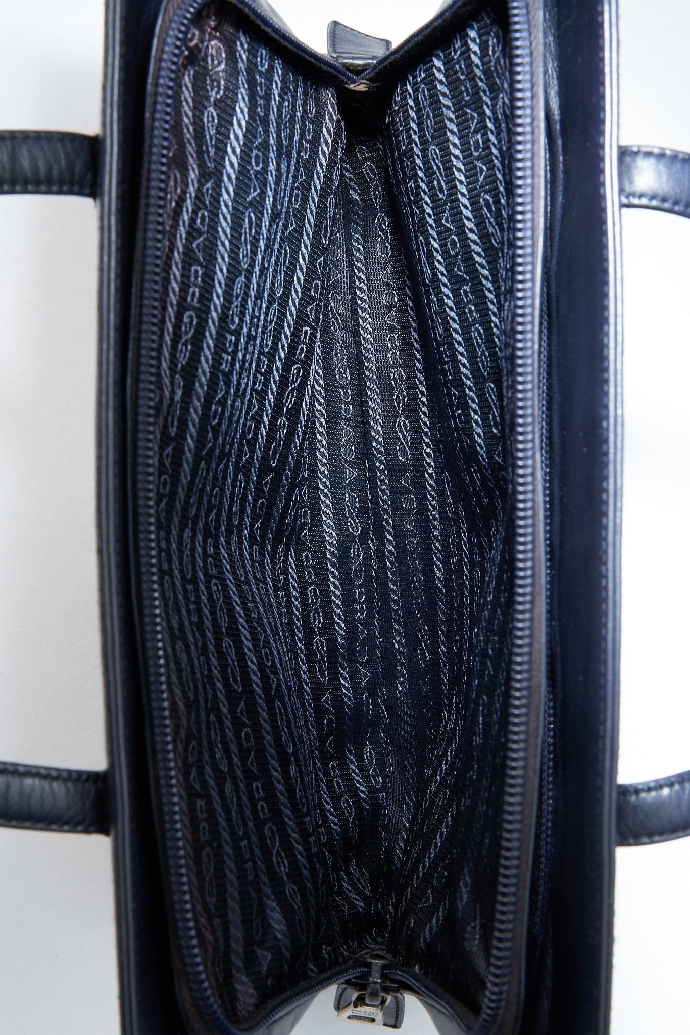 A vintage 90's Prada Navy Leather Shoulder Bag