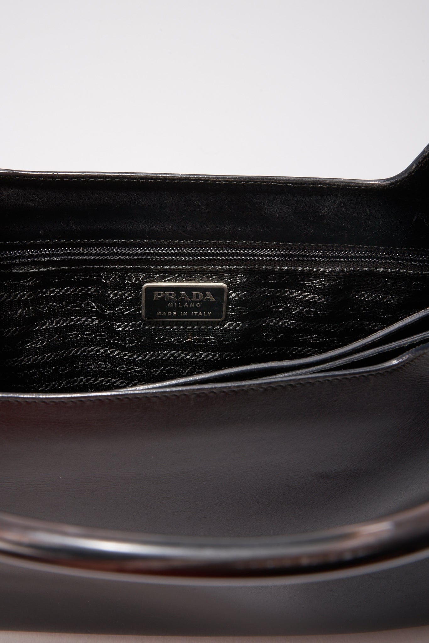 A vintage 90's Prada Black Leather Shoulder Bag with Resin Handles
