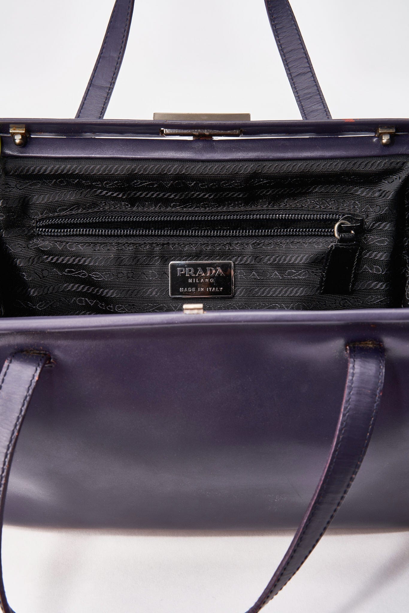 A vintage 90's Prada Purple Leather Shoulder Bag