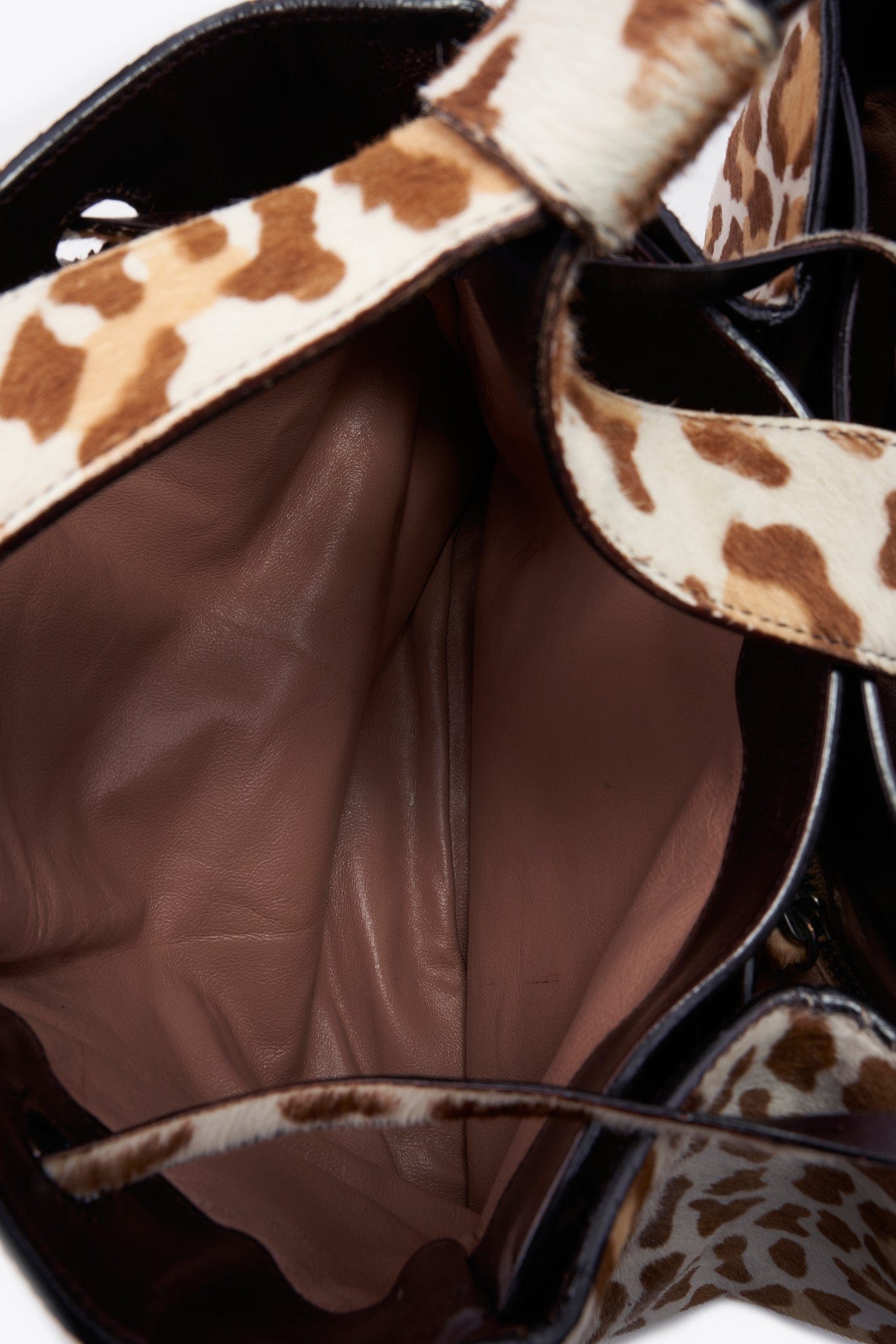 Alaïa Leopard Printed Calf Hair Bucket Bag