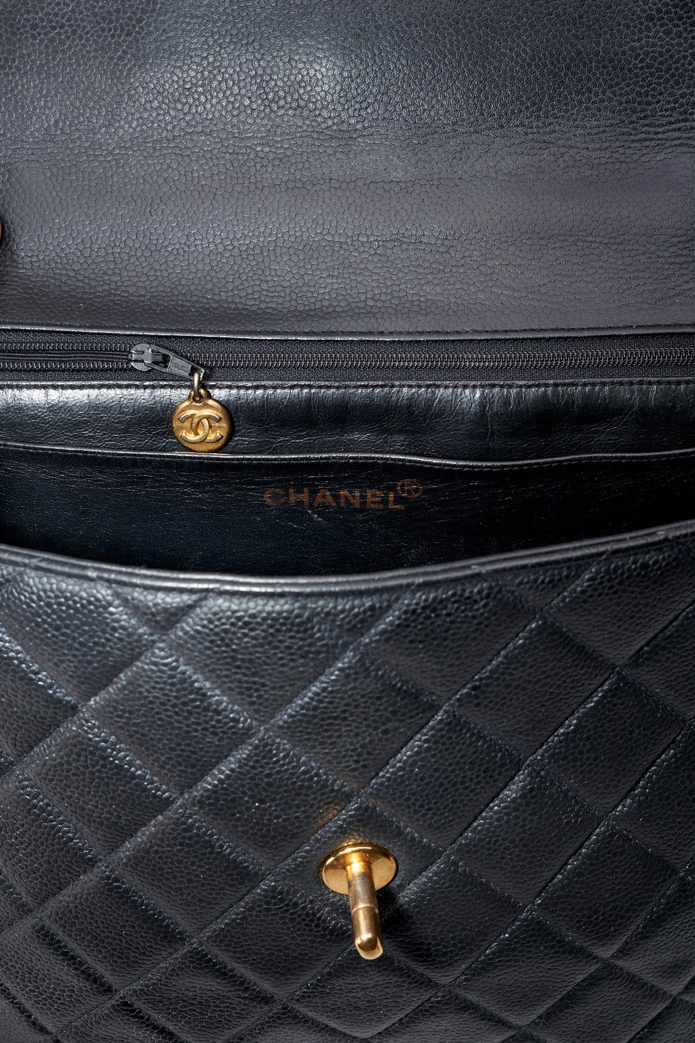 Vintage Chanel Kelly Top Handle Bag in Black Caviar Leather and 24K Gold Plated Hardware