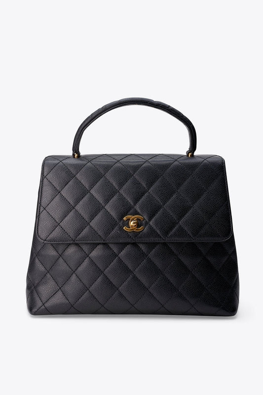Vintage Chanel Kelly Top Handle Bag in Black Caviar Leather