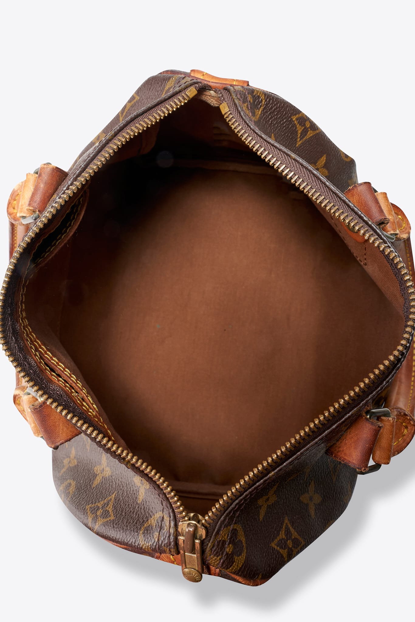Louis Vuitton 25 Speedy Bag In Brown Monogram Coated Canvas