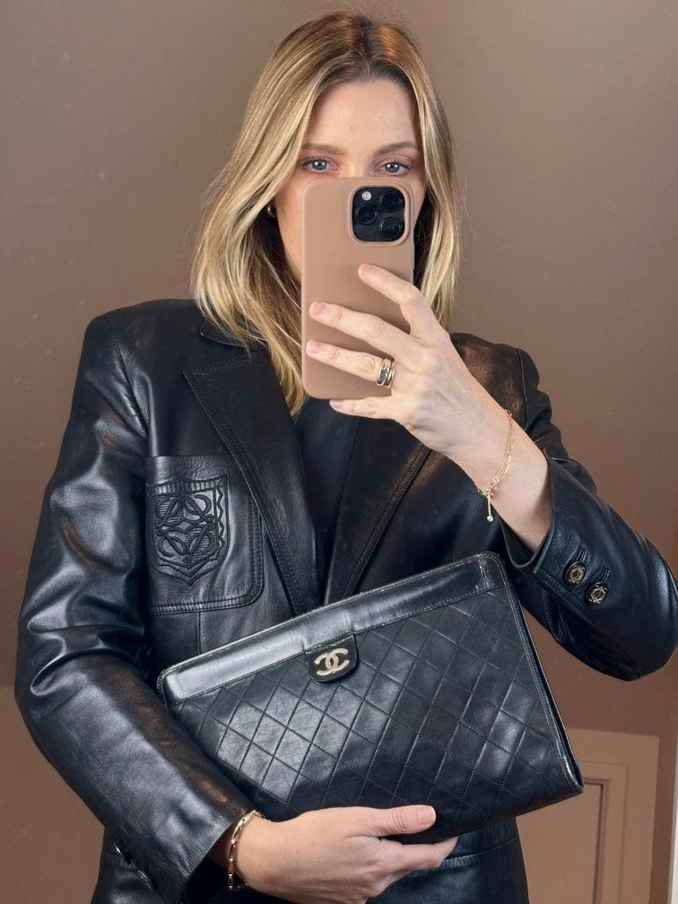 Vintage Chanel Black Leather Clutch Bag With Gold Hardware