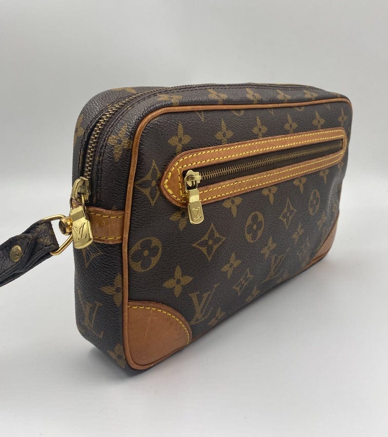 Louis Vuitton Vintage Edition Perforated Accessory Pouch Bag in brown  monogram canvas - Second Hand / Used – Vintega